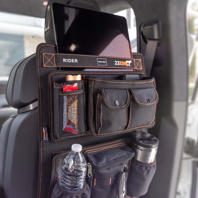 23zero car accessories rider seat organizer in black front left view on passenger seat holding gear