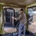 23zero Vehicle Awning Bushman Room Set up with Adult Standing Inside