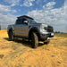 Eezi awn ford ranger roof rack front left view on truck parked outside in field