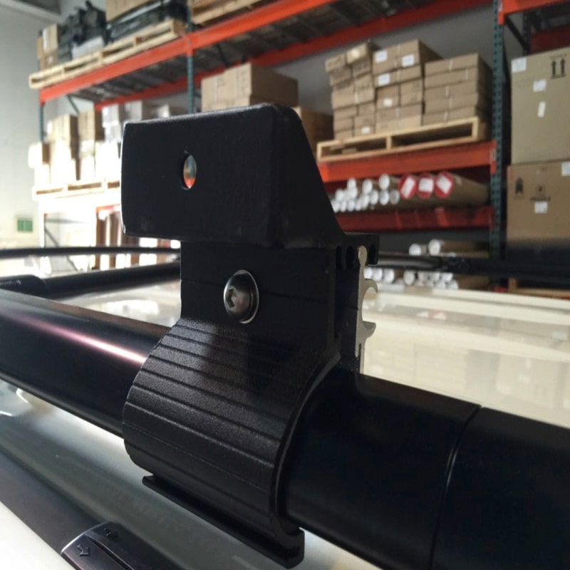 Eezi awning brackets series 2000 g clamp on suv bar front left view in garage