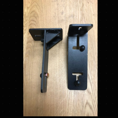 Eezi awning k9 load bar mount pair in black metal top front side view on wooden surface