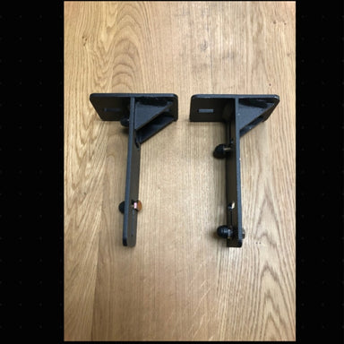Eezi awning k9 load bar mount pair in black metal top side view on wooden surface
