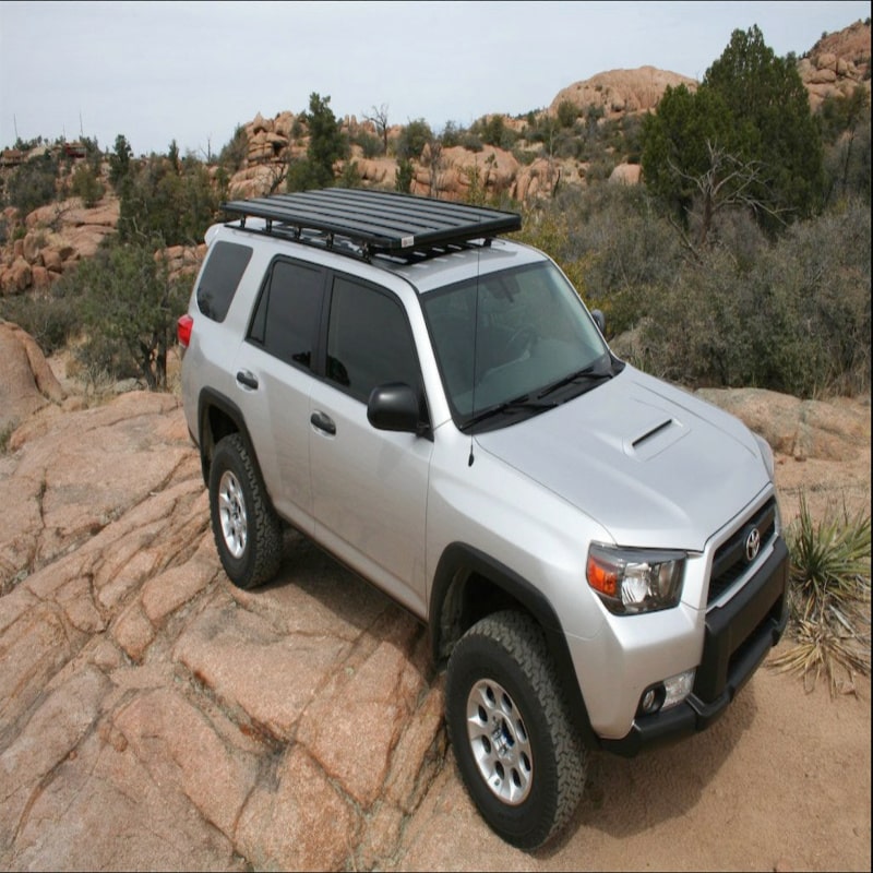 Eezi awn k9 roof rack for roof rails on toyota suv outside on rocky terrain