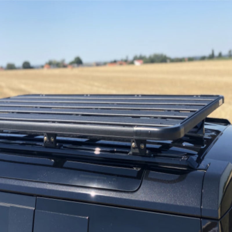 Eezi awn land rover defender roof rack on black suv outside top right view
