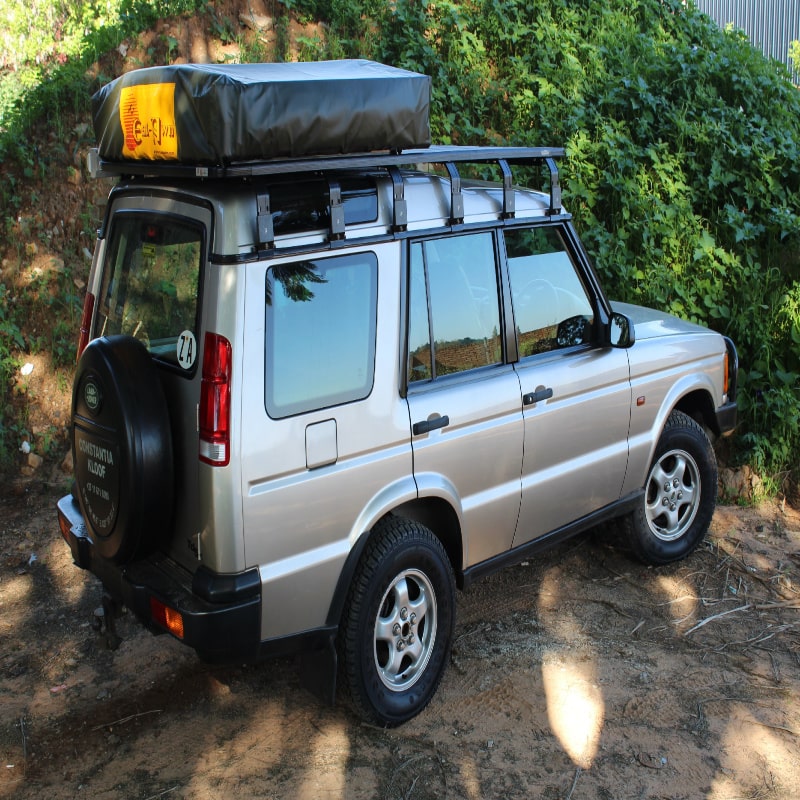 Eezi awn land rover discovery roof rack on jeep with brackets and tent back right view