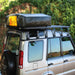 Eezi awn land rover discovery roof rack back right view close upon jeep with tent