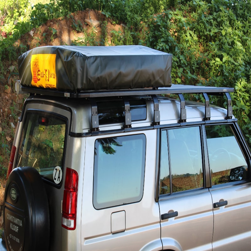 Eezi awn land rover discovery roof rack back right view close upon jeep with tent