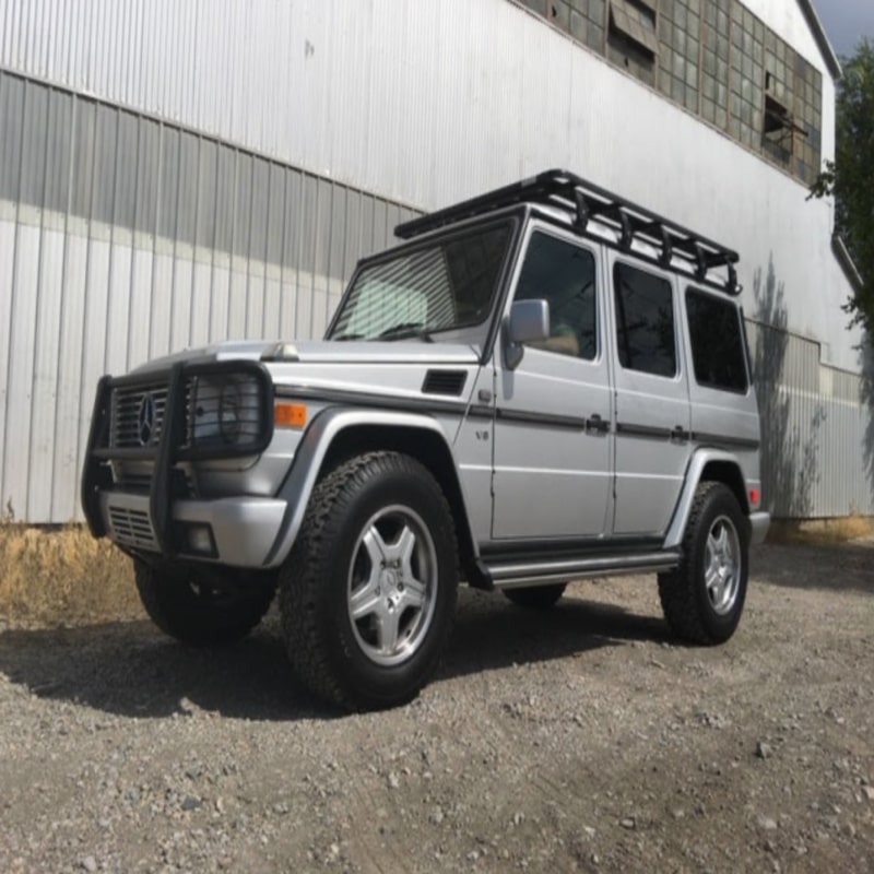 Eezi awn mercedes roof racks on g wagon front right view outside