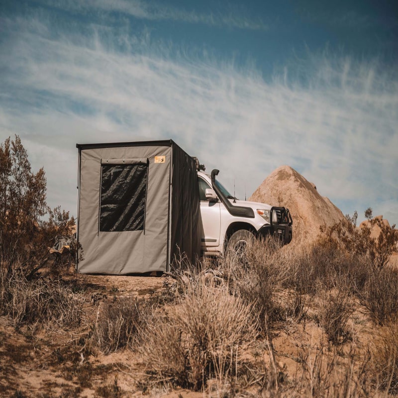 Eezi swift outdoor wall set in grey setup next to suv outside in desert