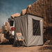 Eezi swift outdoor wall set outside setup next to suv in grey with chair