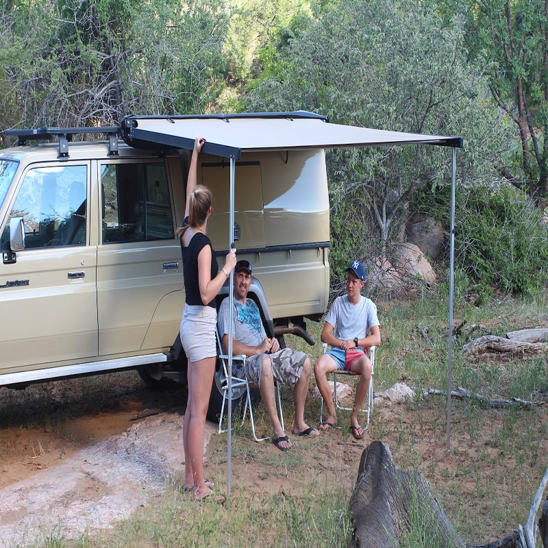 Eez swift retractable awning front right view outside with friends talking