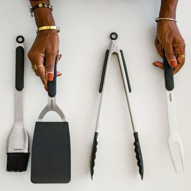 Kenyon barbeque grill 4pc grill kit front view baster spatula tongs and fork out on counter