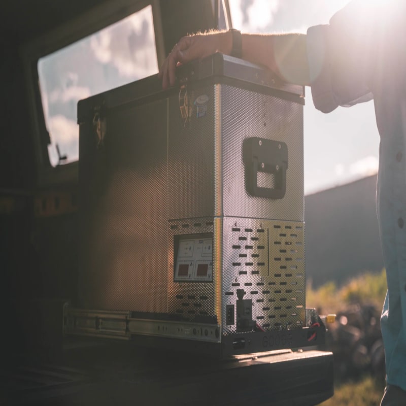 National luna 35l mini fridge close up in truck pulling out in scenic background